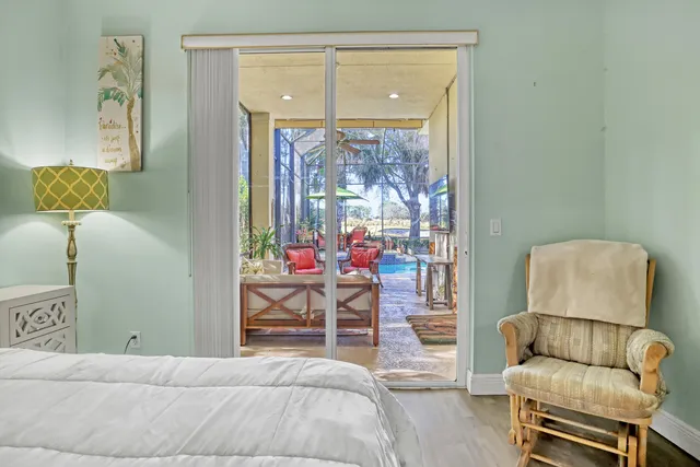 a view of a swimming pool with a lounge chairs