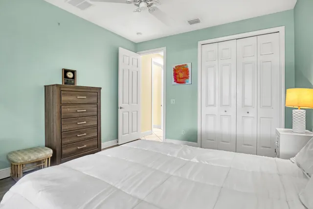 a backyard of a house with lots of green space and fountain