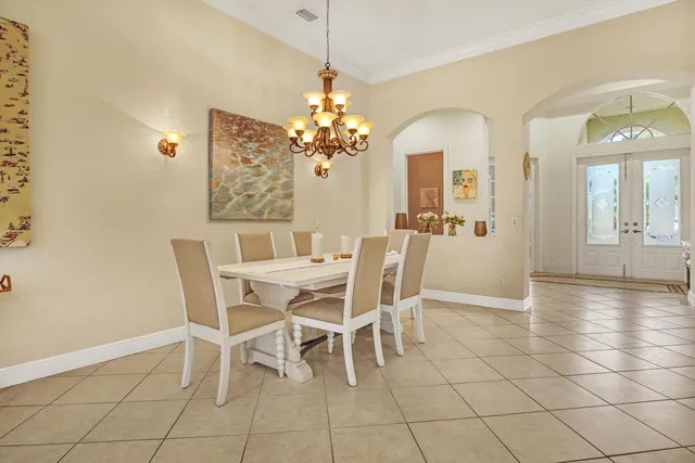 a living room filled with furniture and a table