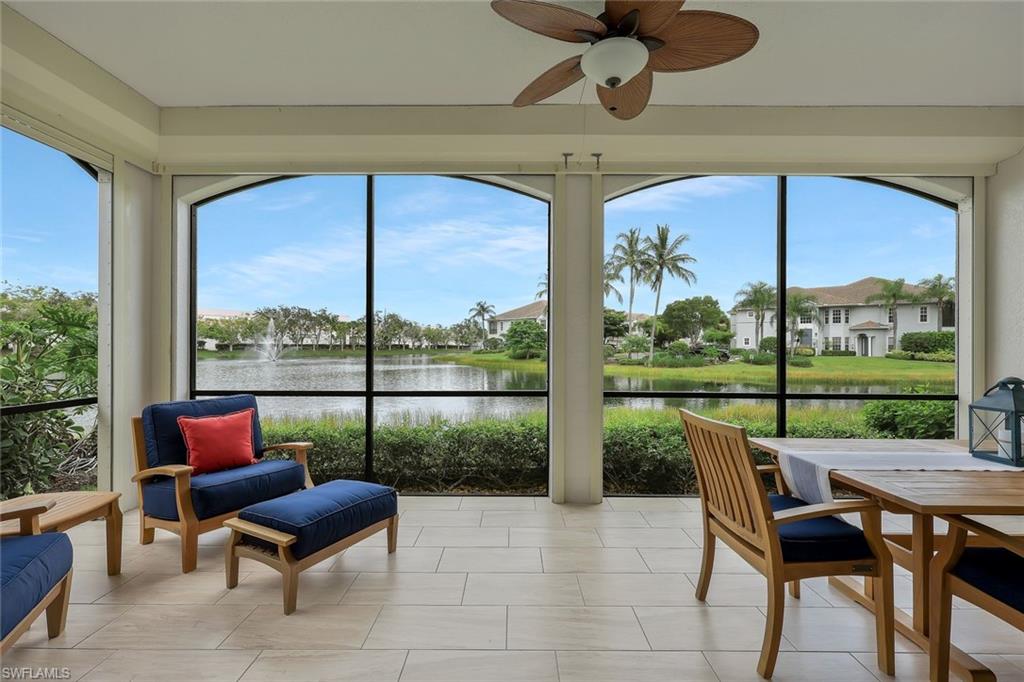 a view of a porch with furniture and yard