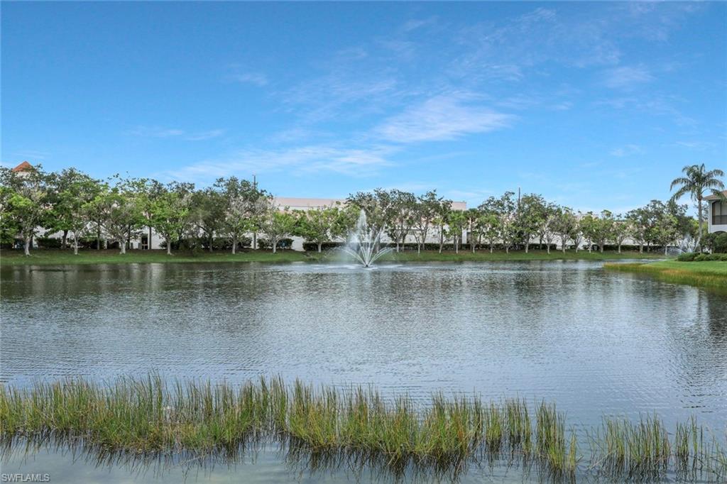 5012 Maxwell Circle, Unit 101 Naples, FL 34105 - Photo 21 of 23 a view of a lake with a city view