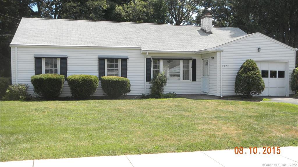 49 Milford Road Manchester, CT 06042 - Photo 1 of 1 a front view of a house with a garden
