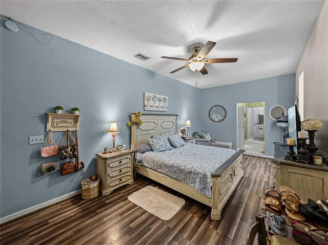 a bathroom with double vanity sink and a mirror