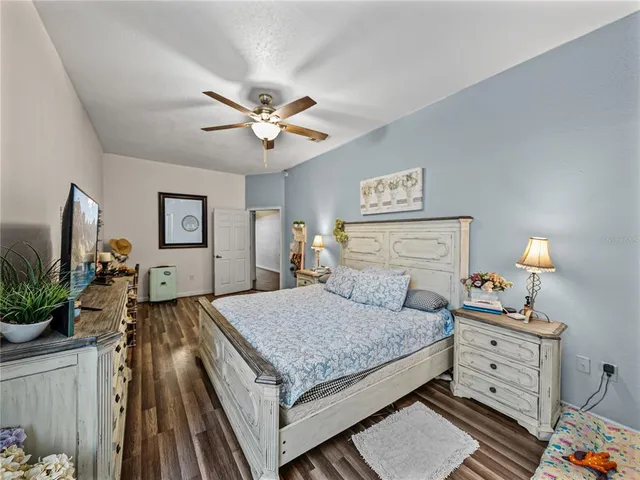 a view of walk in closet with clothes