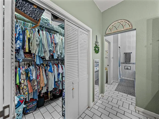 a bathroom with a sink a mirror and a toilet