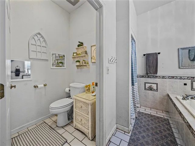 a kitchen with stainless steel appliances a refrigerator sink and microwave