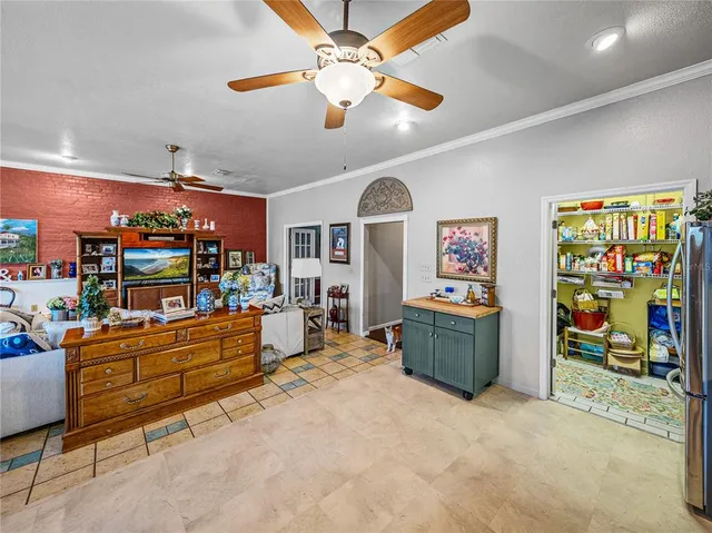 a view of a chairs and table in a patio