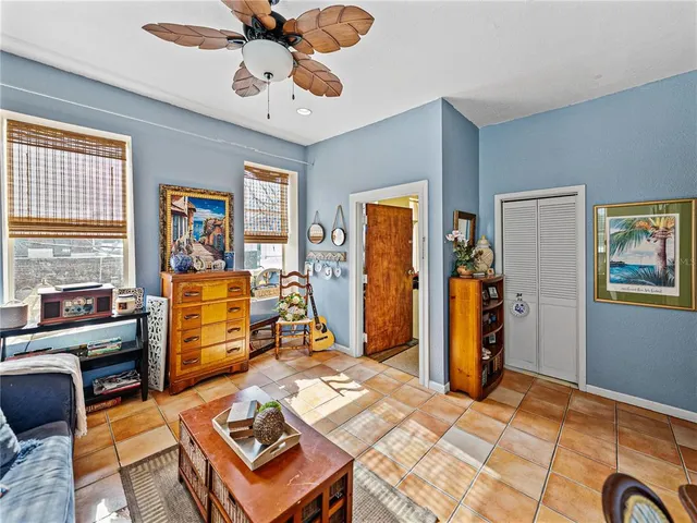 a bedroom with bed and a window