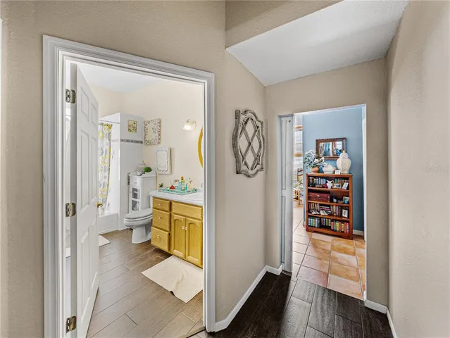 a bedroom with a bed and dresser