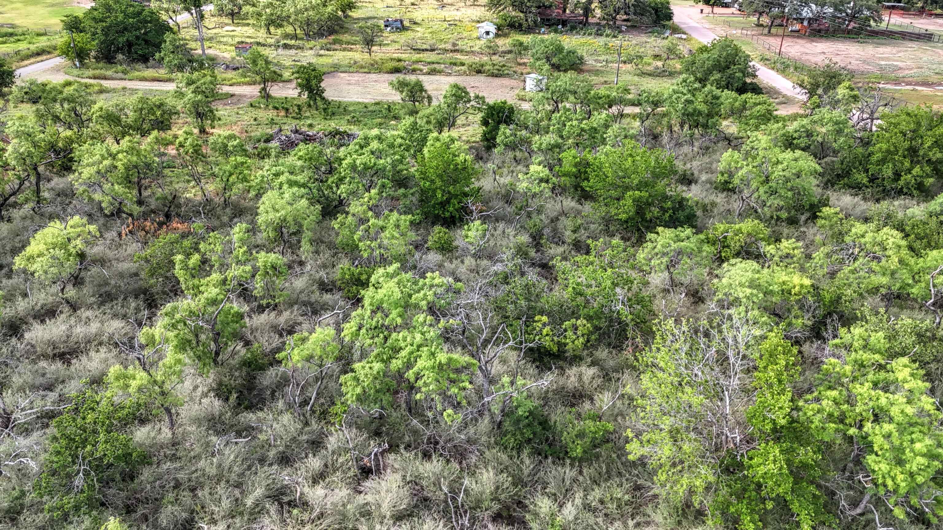 0 East Highway 71 Valley Spring, TX 76885 - Photo 15 of 25 a view of a lake view with houses