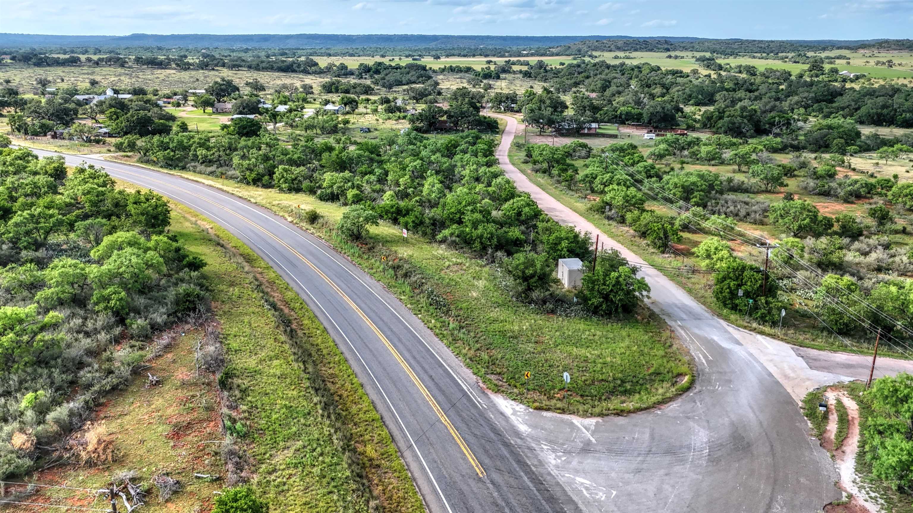 0 East Highway 71 Valley Spring, TX 76885 - Photo 18 of 25 a view of a garden with a lake