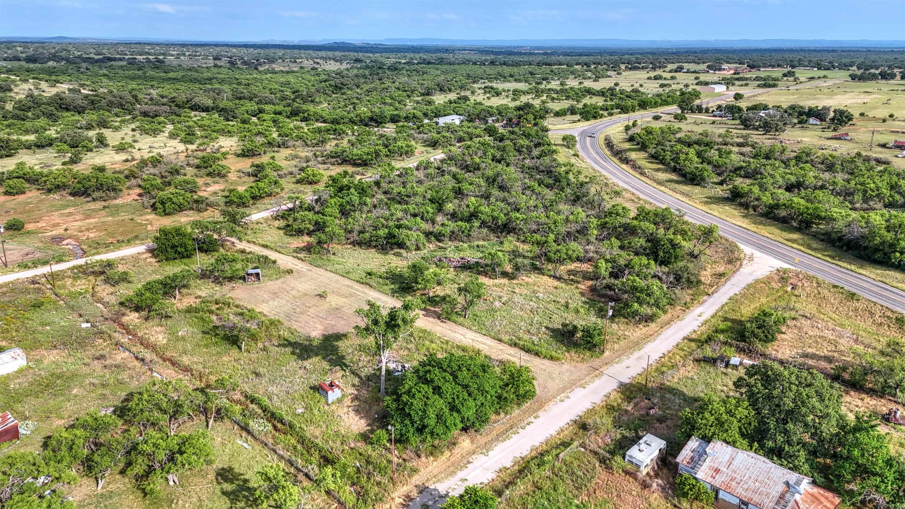 0 East Highway 71 Valley Spring, TX 76885 - Photo 2 of 25 a view of a lush green field