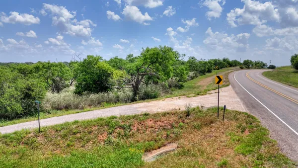 a view of a road from a yard
