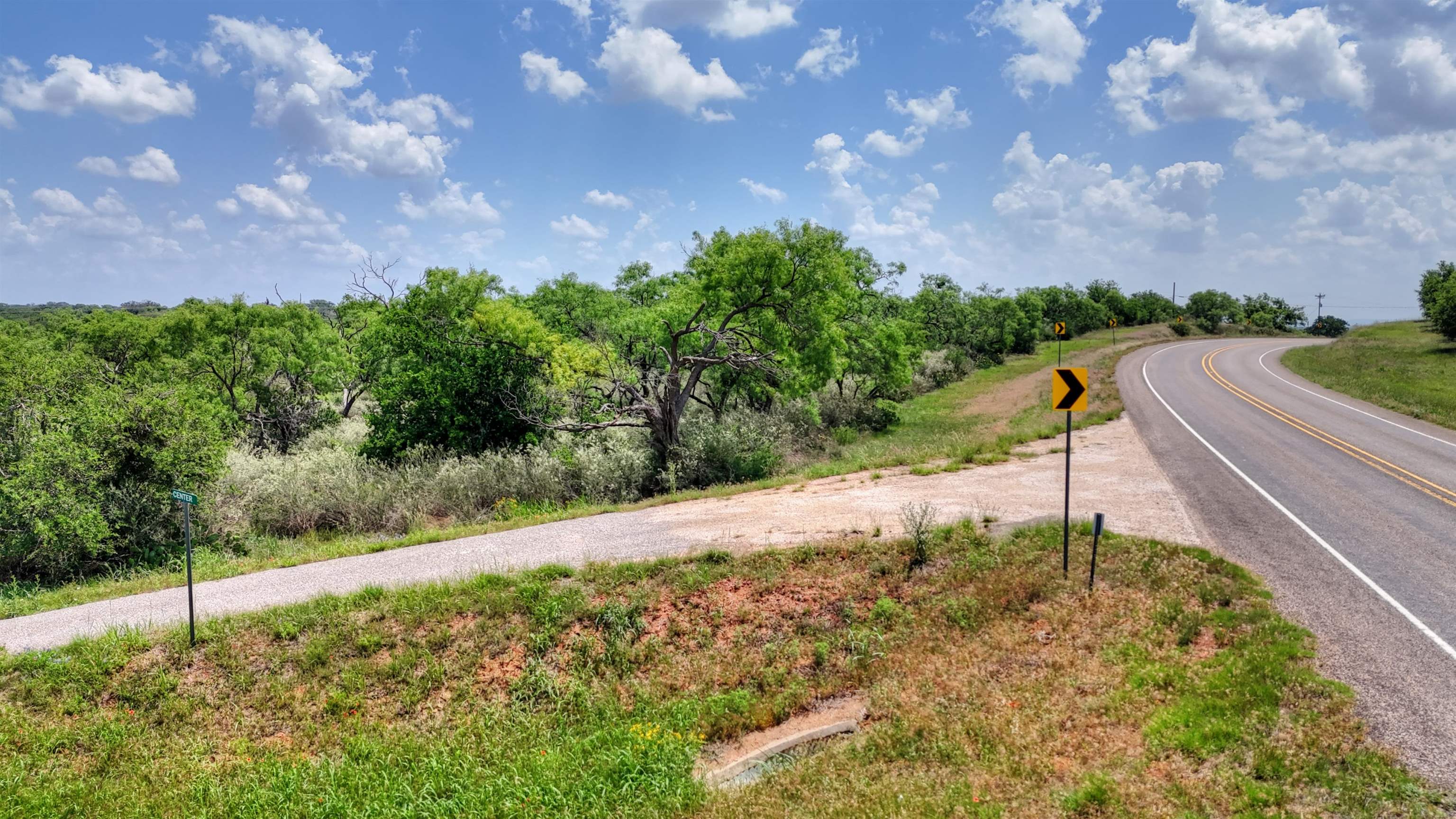 0 East Highway 71 Valley Spring, TX 76885 - Photo 21 of 25 a backyard of a house with lots of green space