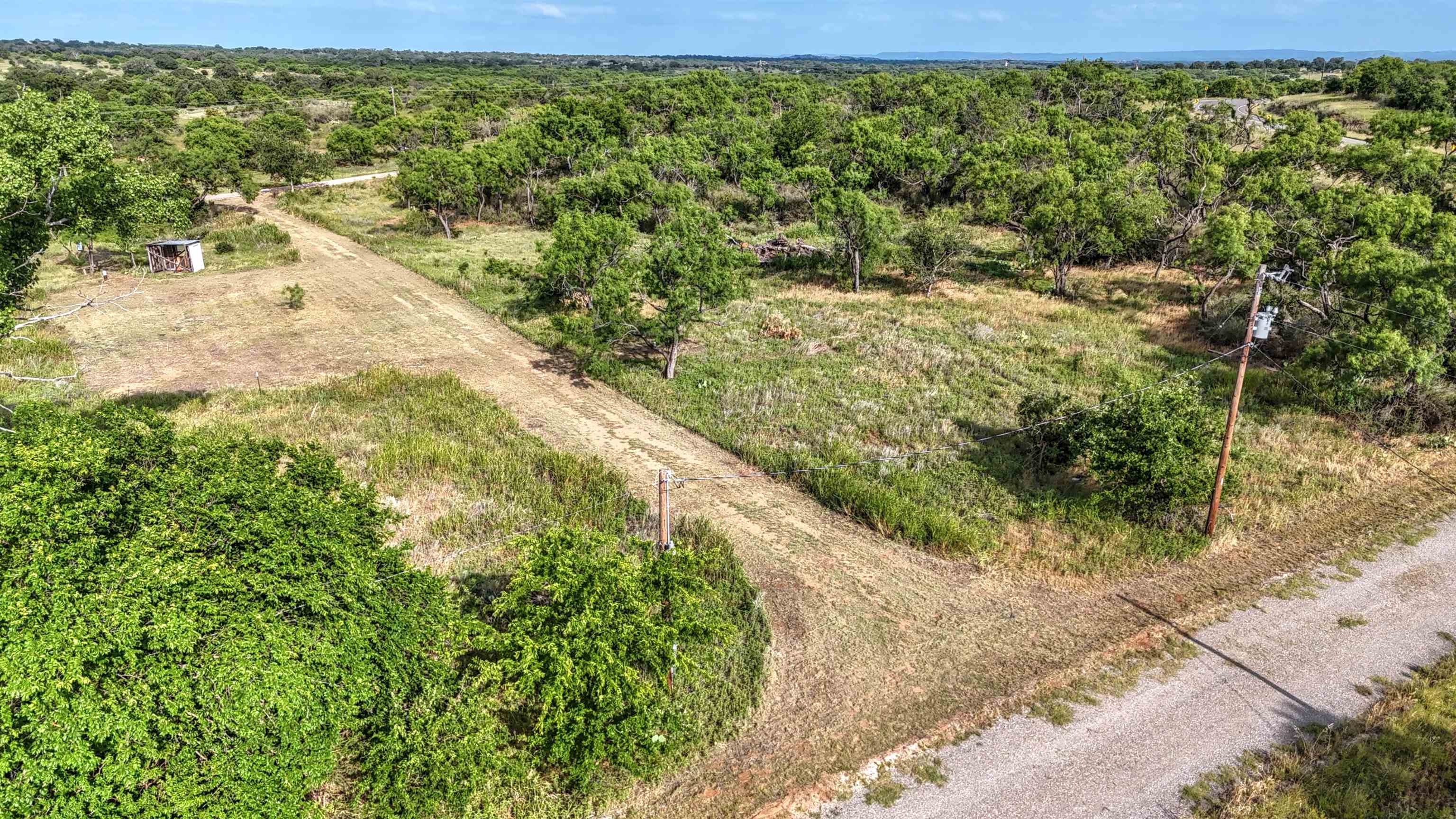 0 East Highway 71 Valley Spring, TX 76885 - Photo 4 of 25 a view of a yard with plants