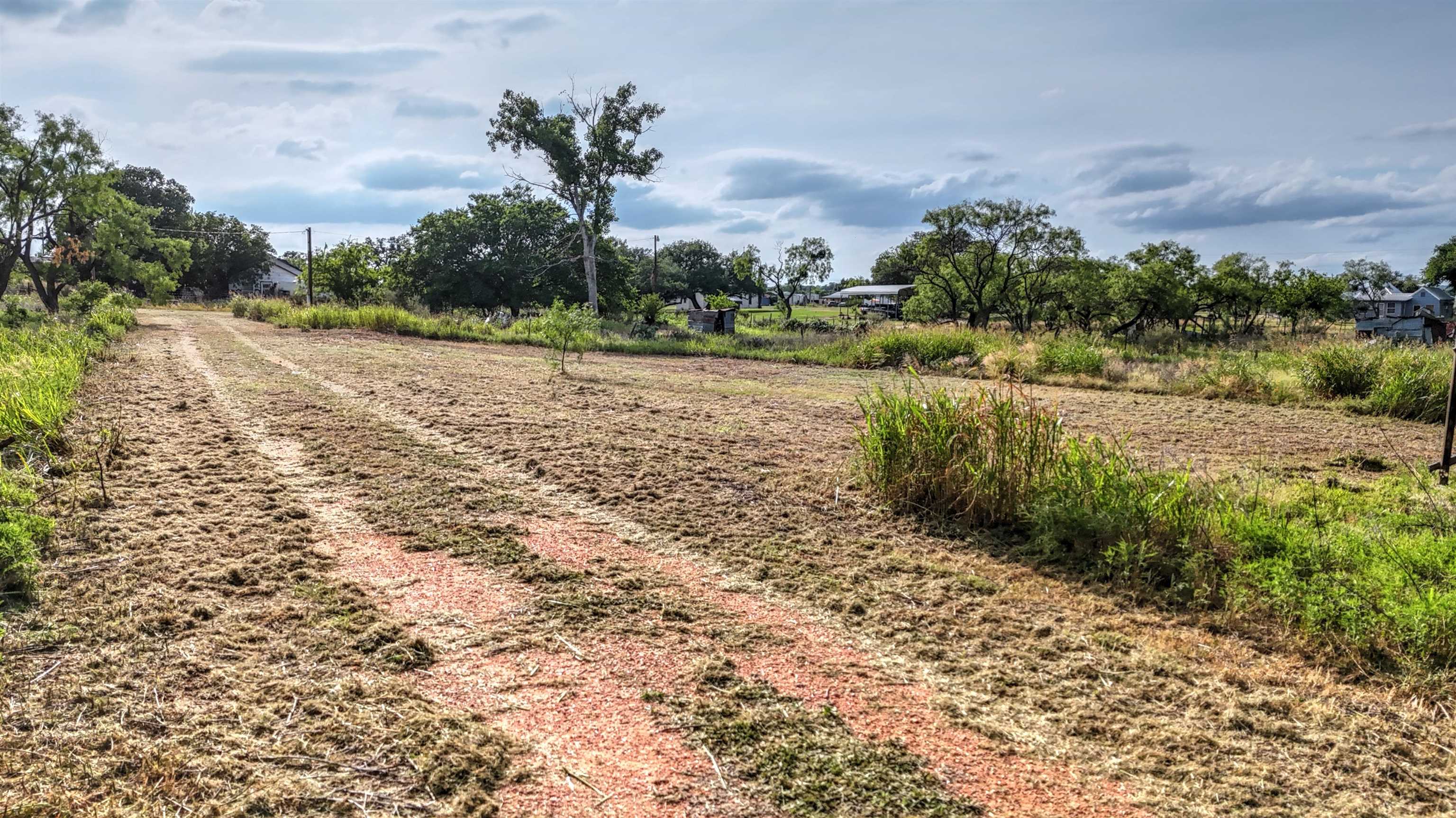 0 East Highway 71 Valley Spring, TX 76885 - Photo 8 of 25 a view of a lake with a big yard