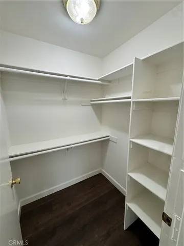 a view of an empty walk in closet