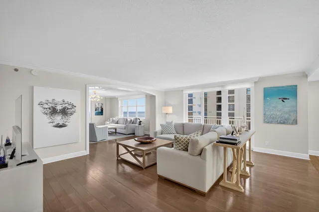 a view of a livingroom with furniture and a window
