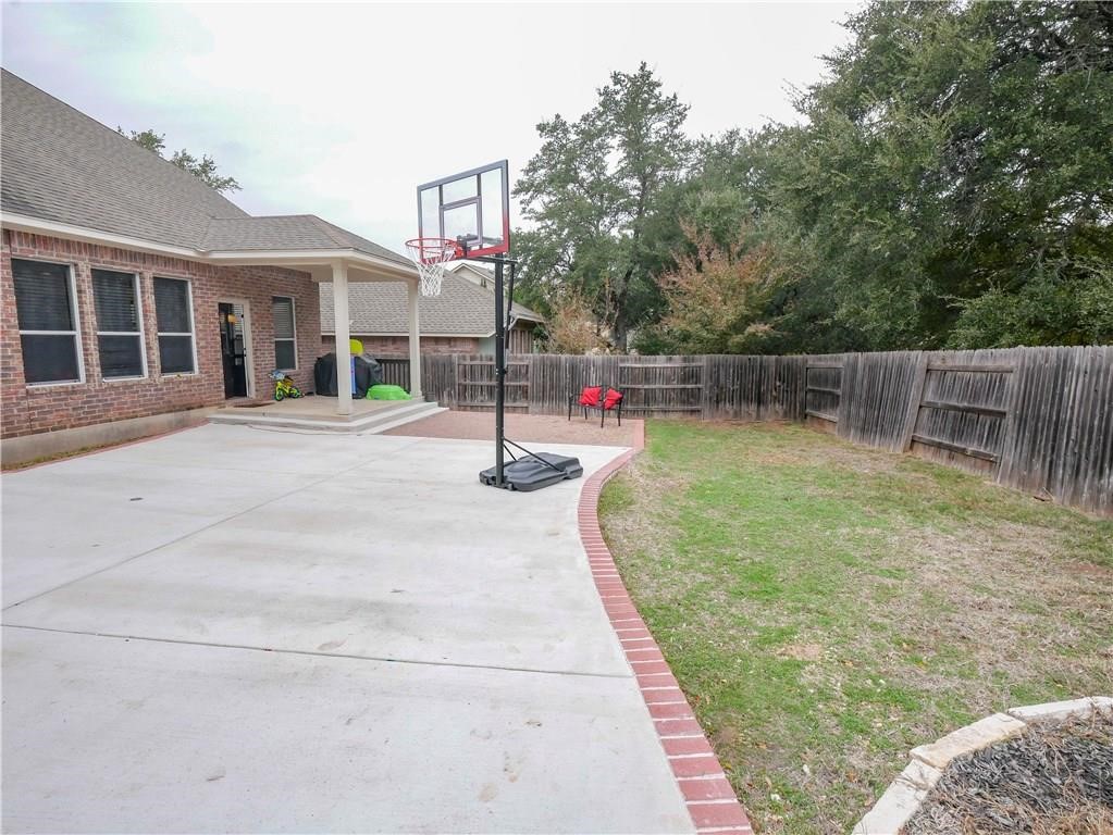 702 South Frontier Lane Cedar Park, TX 78613 - Photo 30 of 30 a view of a house with a backyard