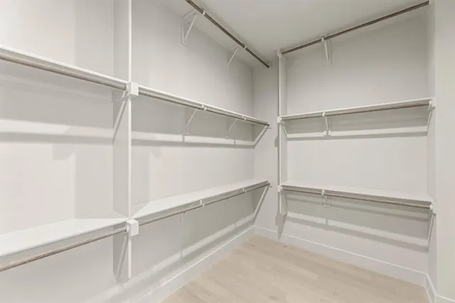 a view of an empty walk in closet