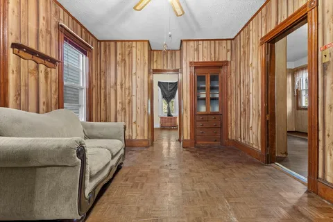 a living room with furniture and a window