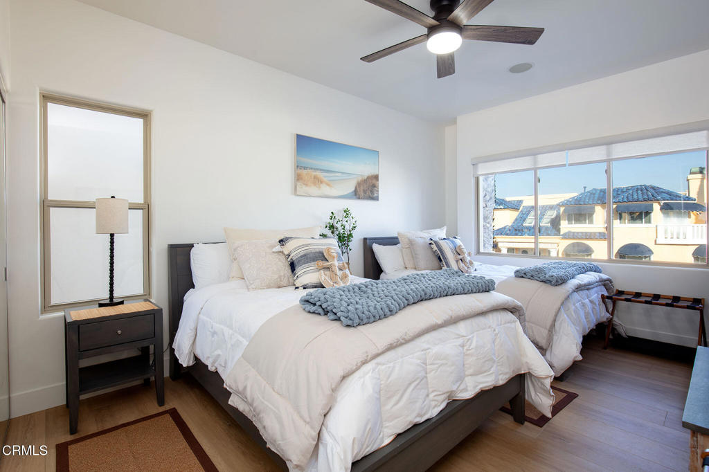 815 Mandalay Beach Road Oxnard, CA 93035 - Photo 20 of 29 a bedroom with a bed and window
