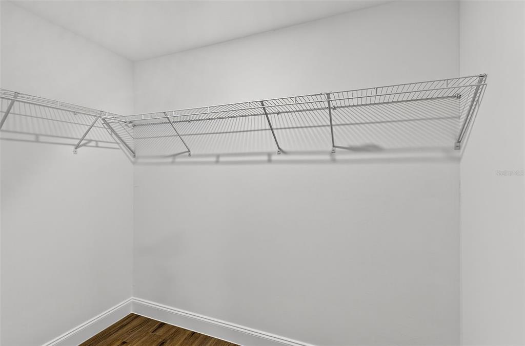486 Celeste Street Port Charlotte, FL 33954 - Photo 19 of 35 a view of a room with racks on the wall