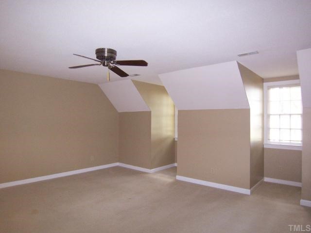 2216 Effingham Circle Raleigh, NC 27615 - Photo 8 of 12 Upstairs, the big MBR has neutral carpet, CF, lg WIC & priv tiled Bath w/dbl sinks.