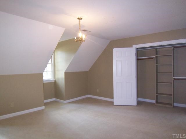 2216 Effingham Circle Raleigh, NC 27615 - Photo 9 of 12 2 more BRs (this one is really big) w/neutral carpet & lg closets share the spacious tiled hall Bath w/dbl sinks.