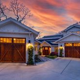 a front view of a house with yard