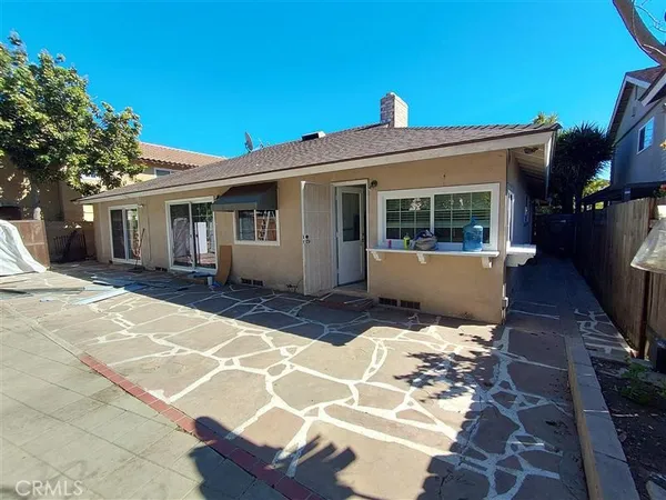 a view of house with yard