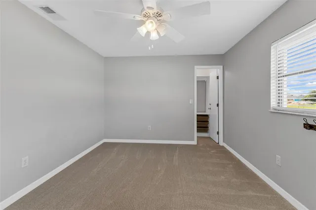 a bathroom with a double vanity sink mirror and