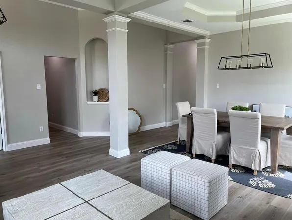 a view of a dining room with furniture