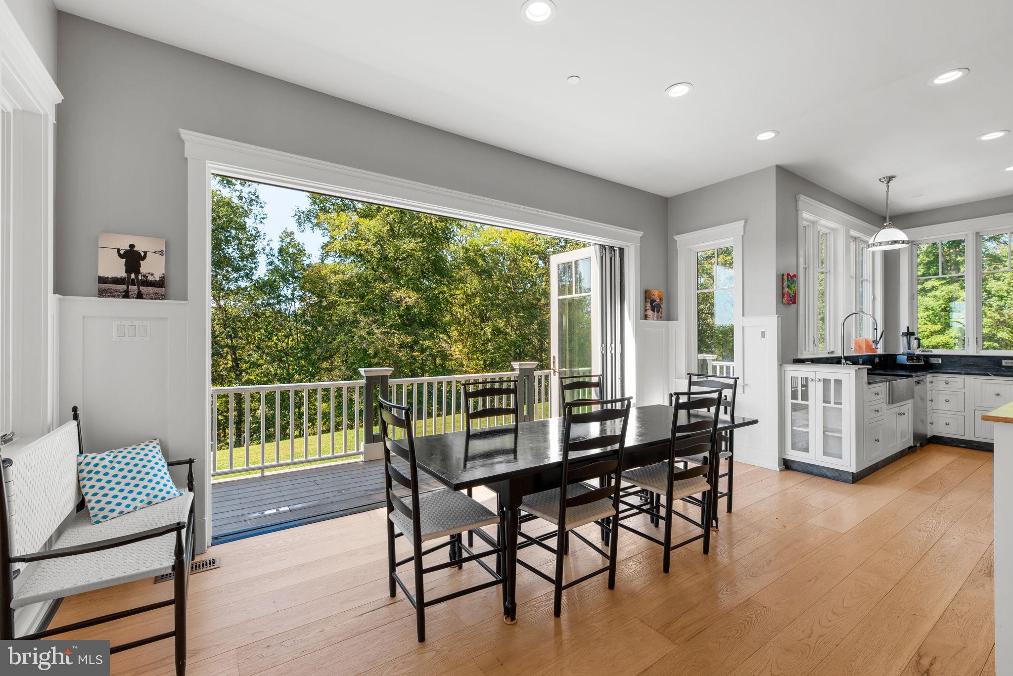 3216 Ramsland Way Frederick, MD 21704 - Photo 15 of 90 a dining room with furniture and large windows