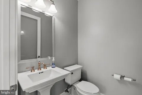 a view of a balcony with wooden floor