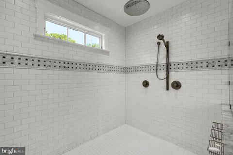 a view of a garden with lawn chairs