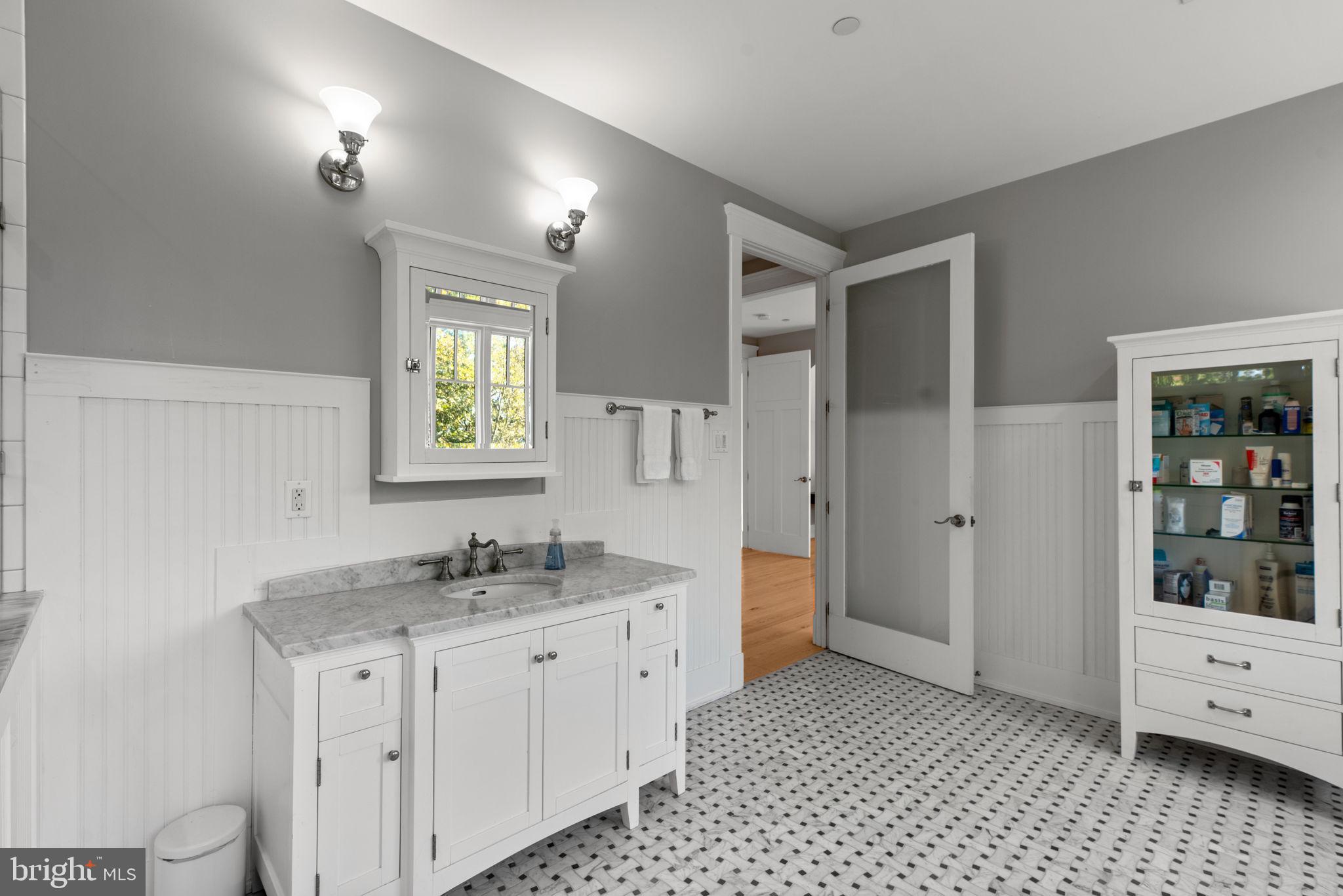 3216 Ramsland Way Frederick, MD 21704 - Photo 46 of 90 a bathroom with a sink double vanity and a shower
