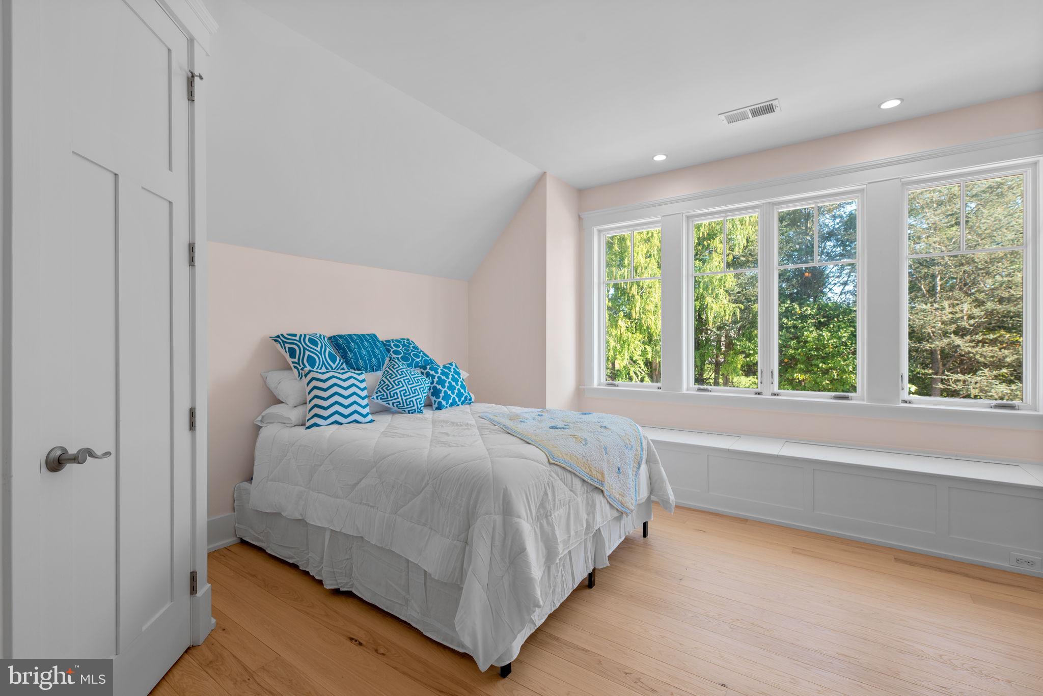 3216 Ramsland Way Frederick, MD 21704 - Photo 51 of 90 a bedroom with a large bed and a large window