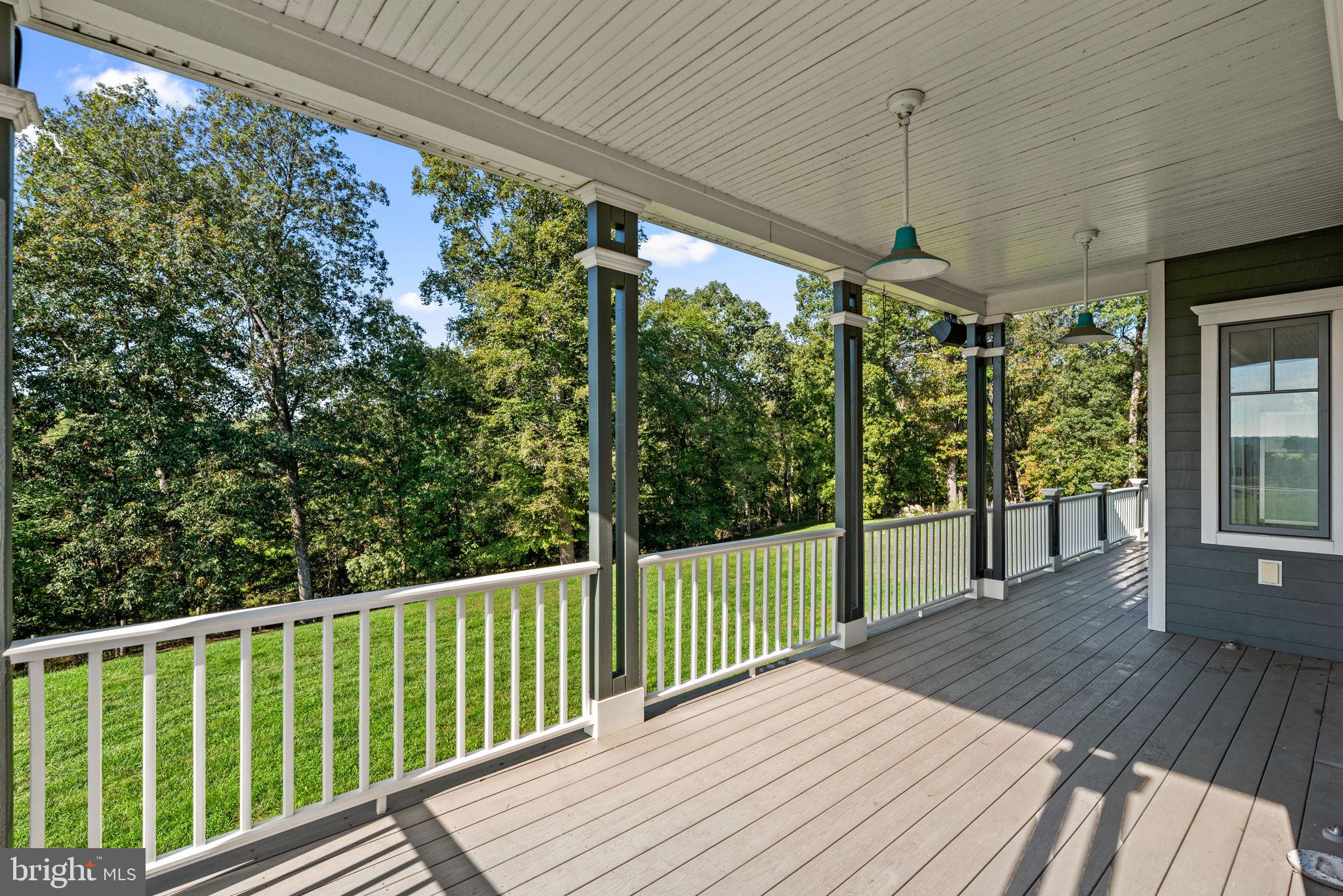 3216 Ramsland Way Frederick, MD 21704 - Photo 73 of 90 a view of a balcony with wooden floor