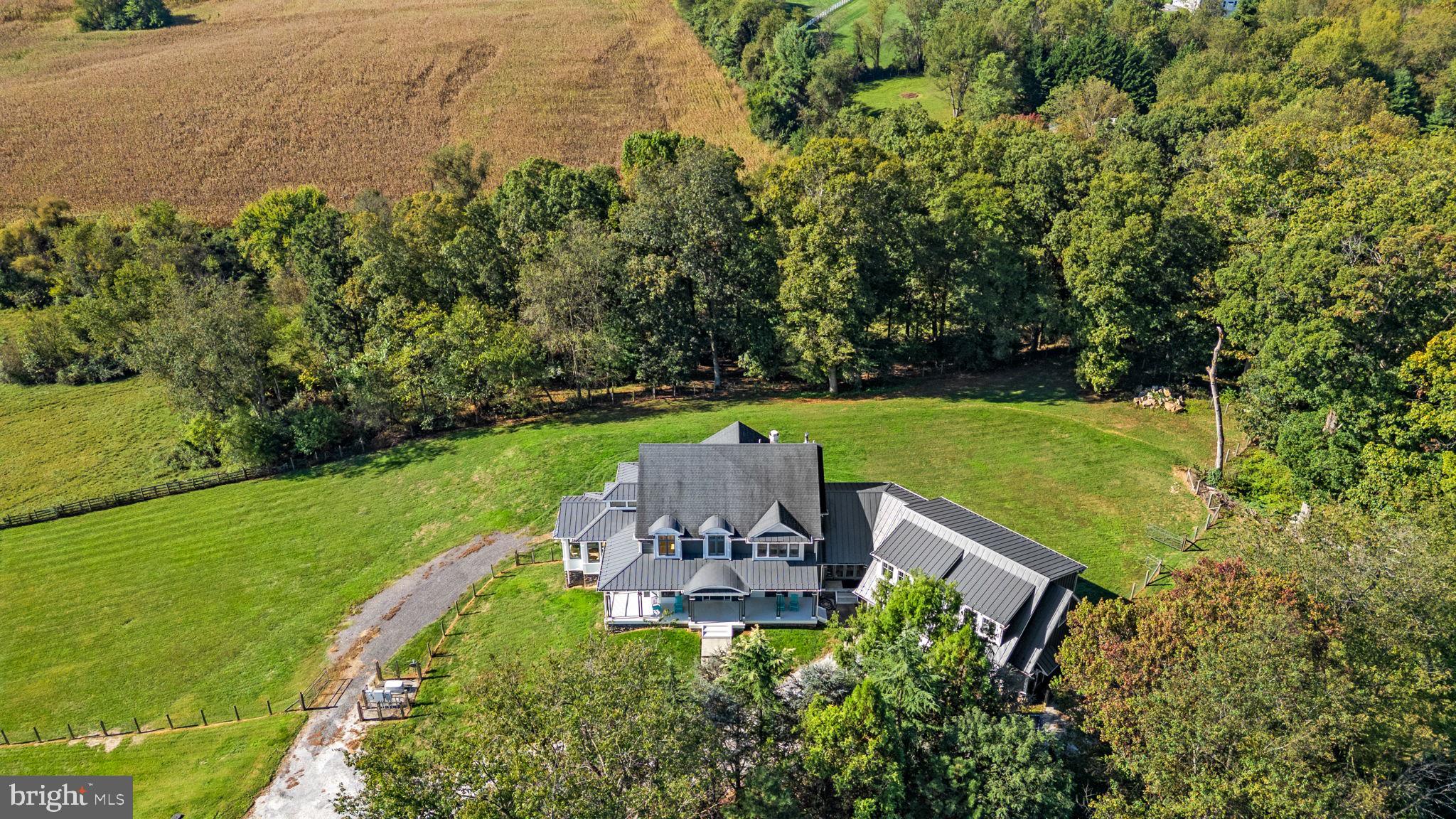 3216 Ramsland Way Frederick, MD 21704 - Photo 82 of 90 50 yr architectural shingle and 100 yr metal roof