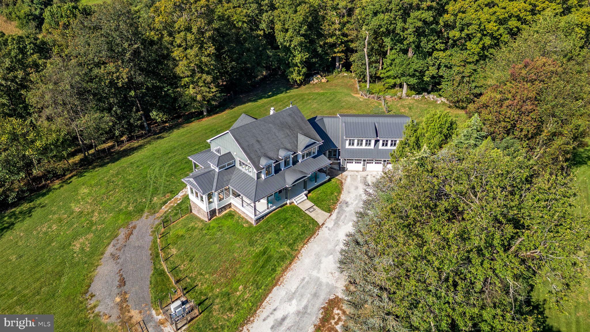 3216 Ramsland Way Frederick, MD 21704 - Photo 84 of 90 an aerial view of a house with a garden