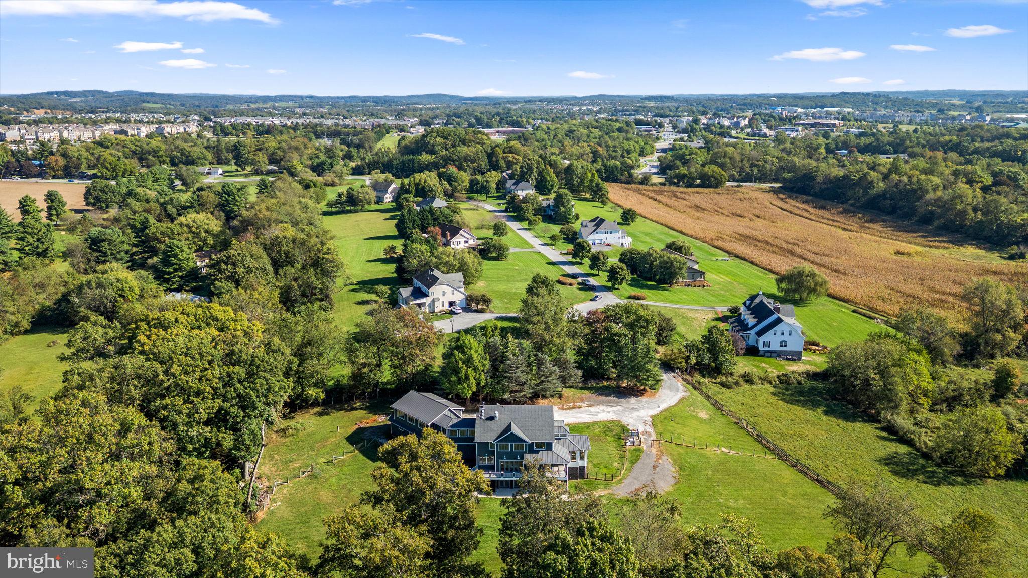 3216 Ramsland Way Frederick, MD 21704 - Photo 89 of 90 an aerial view of residential houses with outdoor space and trees