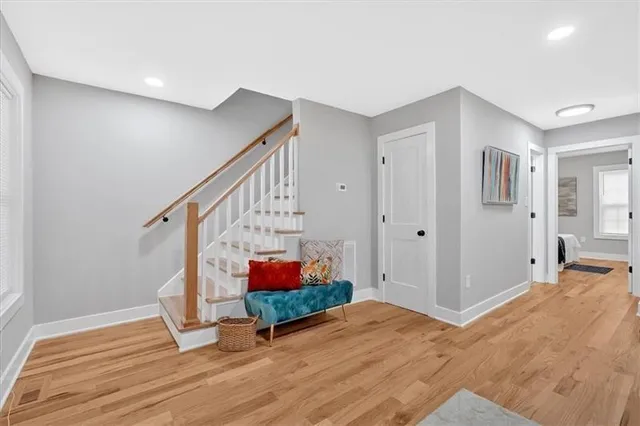a view of entryway with wooden floor