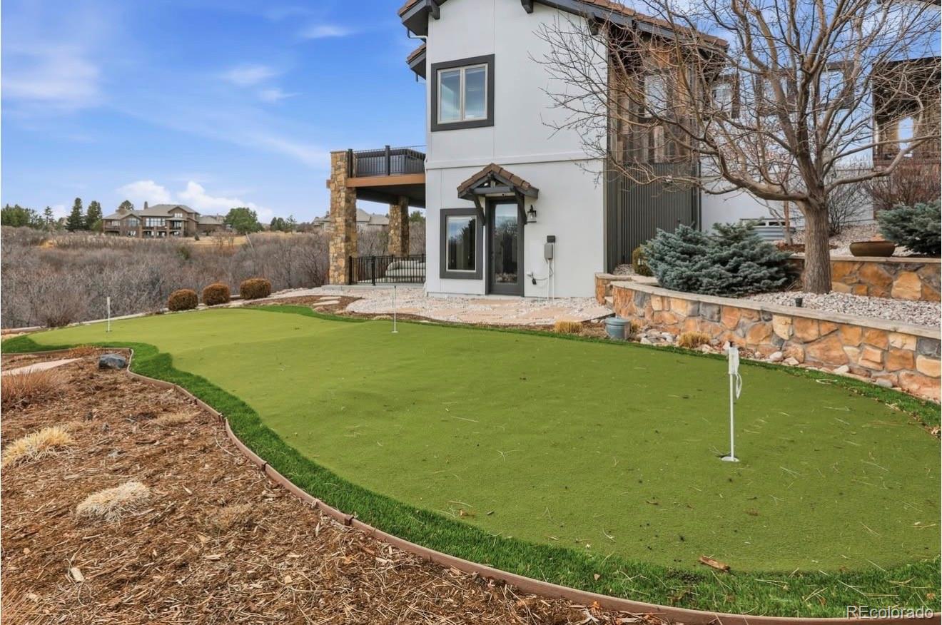 843 Diamond Ridge Circle Castle Rock, CO 80108 - Photo 27 of 31 a view of a house with a yard