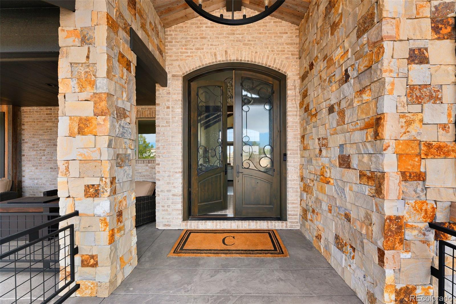 843 Diamond Ridge Circle Castle Rock, CO 80108 - Photo 3 of 31 a front view of a building with glass door