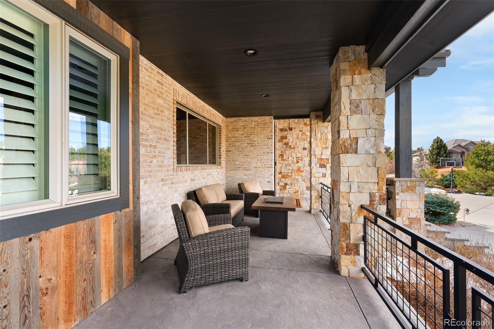 843 Diamond Ridge Circle Castle Rock, CO 80108 - Photo 4 of 31 a view of living room with balcony and furniture