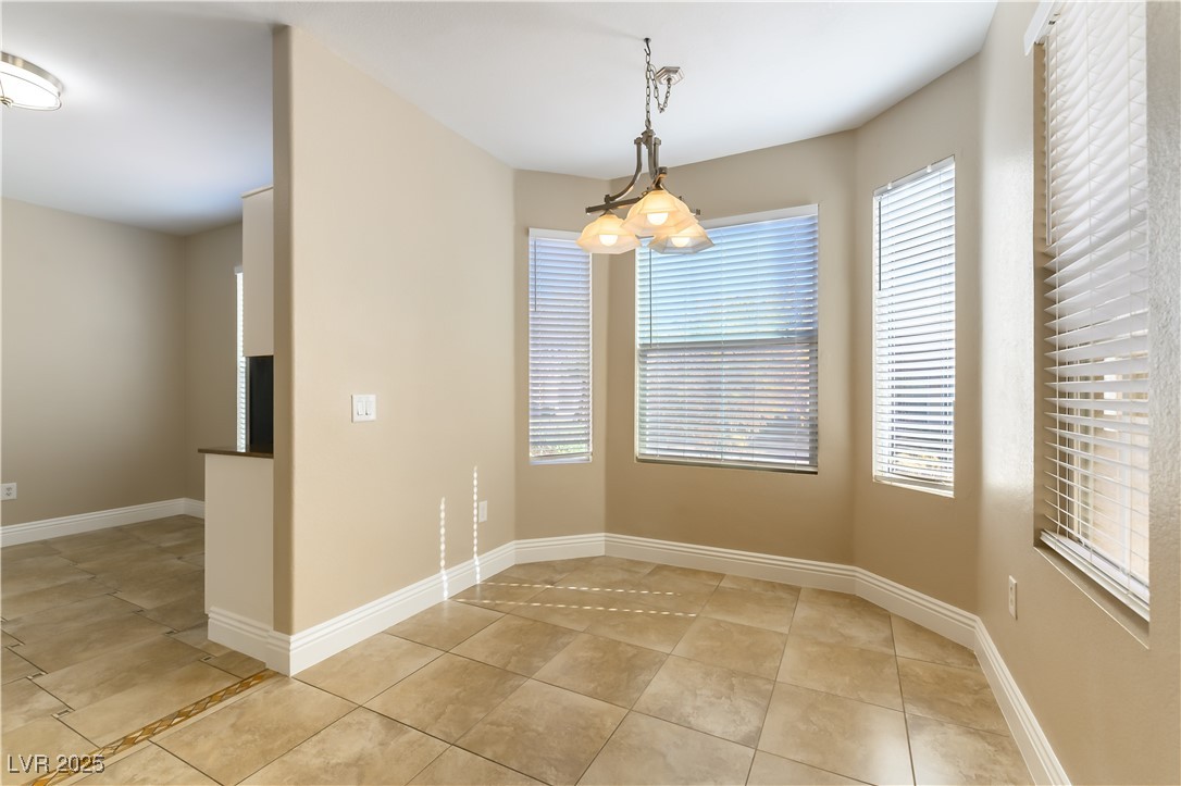 10550 West Alexander Road, Unit 1156 Las Vegas, NV 89129 - Photo 8 of 35 Separate dining area from kitchen