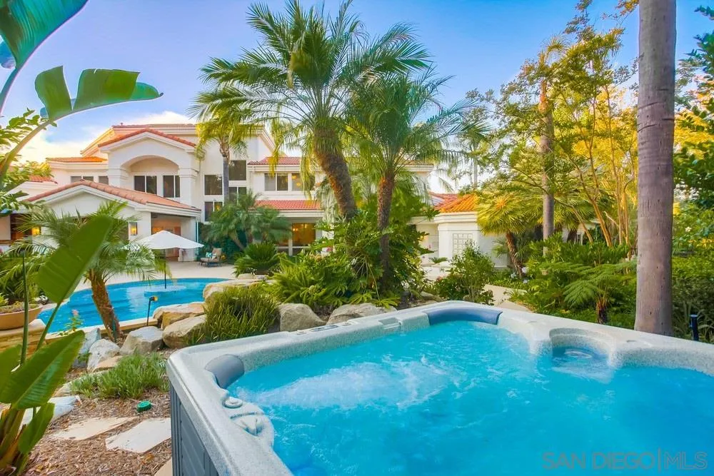 13409 Highlands Ranch Road Poway, CA 92064 - Photo 17 of 24 a view of a house with a backyard