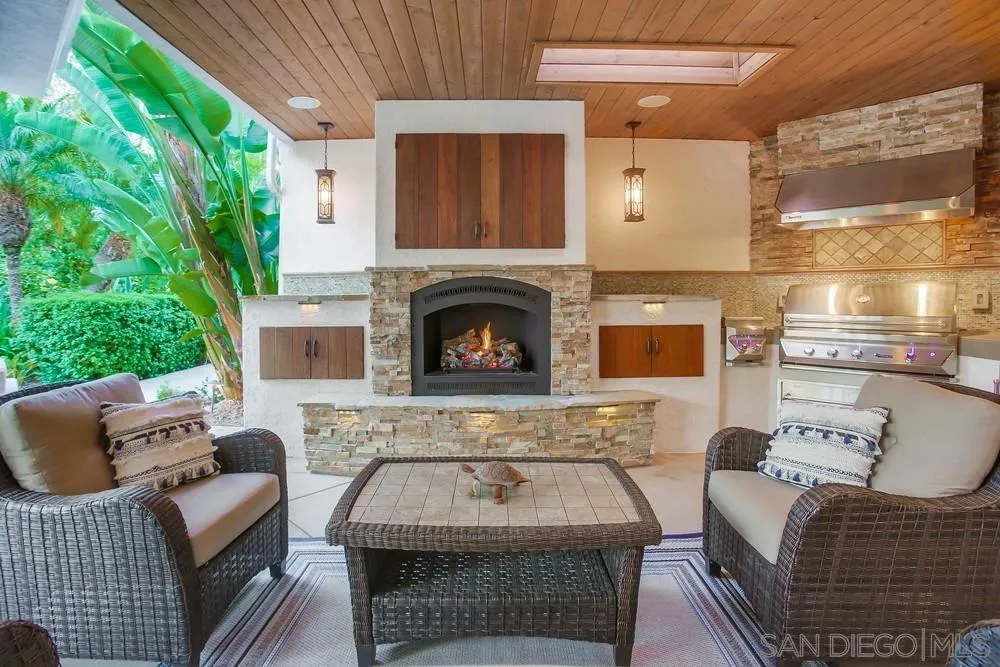13409 Highlands Ranch Road Poway, CA 92064 - Photo 7 of 24 a living room with furniture and a fireplace