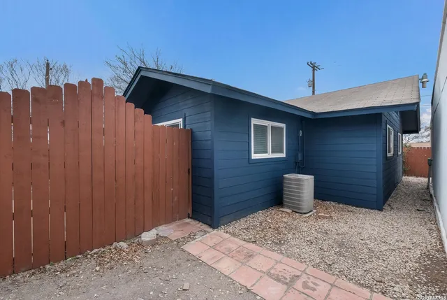 a house view with a backyard space